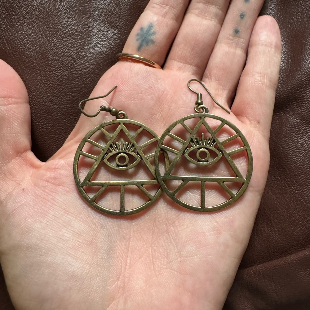 Dolls Kill Bronze Eye Earrings